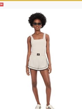 Free people FP movement varsity blues romper size small cream and black